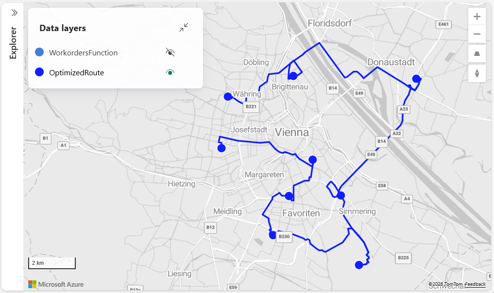 A screenshot of the Microsoft Fabric Maps displaying a street map of Vienna Austria with an optimized route shown as blue lines connecting nine numbered waypoints. The Explorer pane on the left shows the Lakehouse tab expanded with WorkorderLocationsLakehouse containing a Files folder with OptimizedRoute.geojson and WorkorderLocations.csv files. The Data layers panel displays two layers: WorkordersFunction with visibility toggled off and OptimizedRoute showing the connected route path with numbered stops from 1 to 9 indicating the optimized visit sequence.