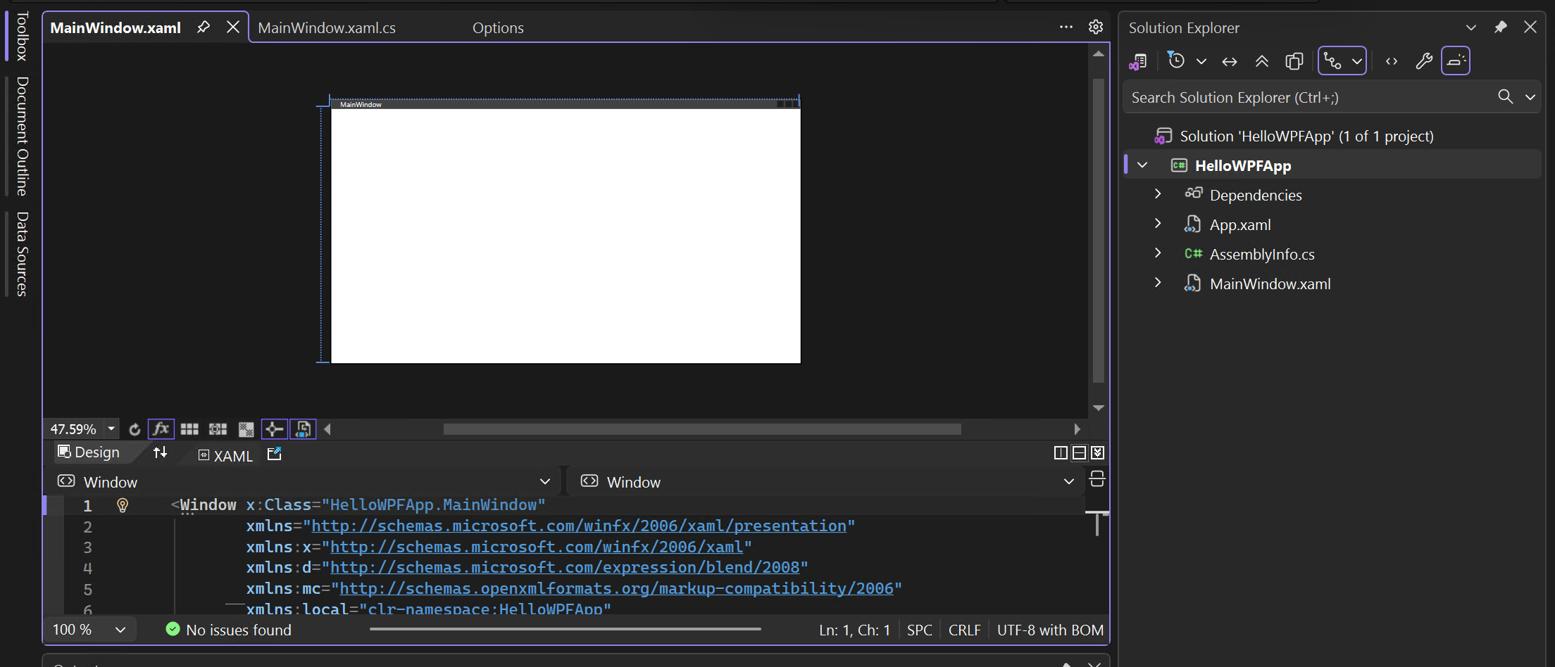 Screenshot of the project and solution in Solution Explorer, and the XAML and designer views of 'MainWindow.xaml' open.
