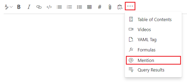 Captura de pantalla que muestra cómo seleccionar @ Mencion en el menú Más opciones para agregar una mención para un usuario o grupo en la página wiki.