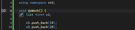 Captura de tela mostrando o depurador pausado em um ponto de interrupção definido no Visual Studio.